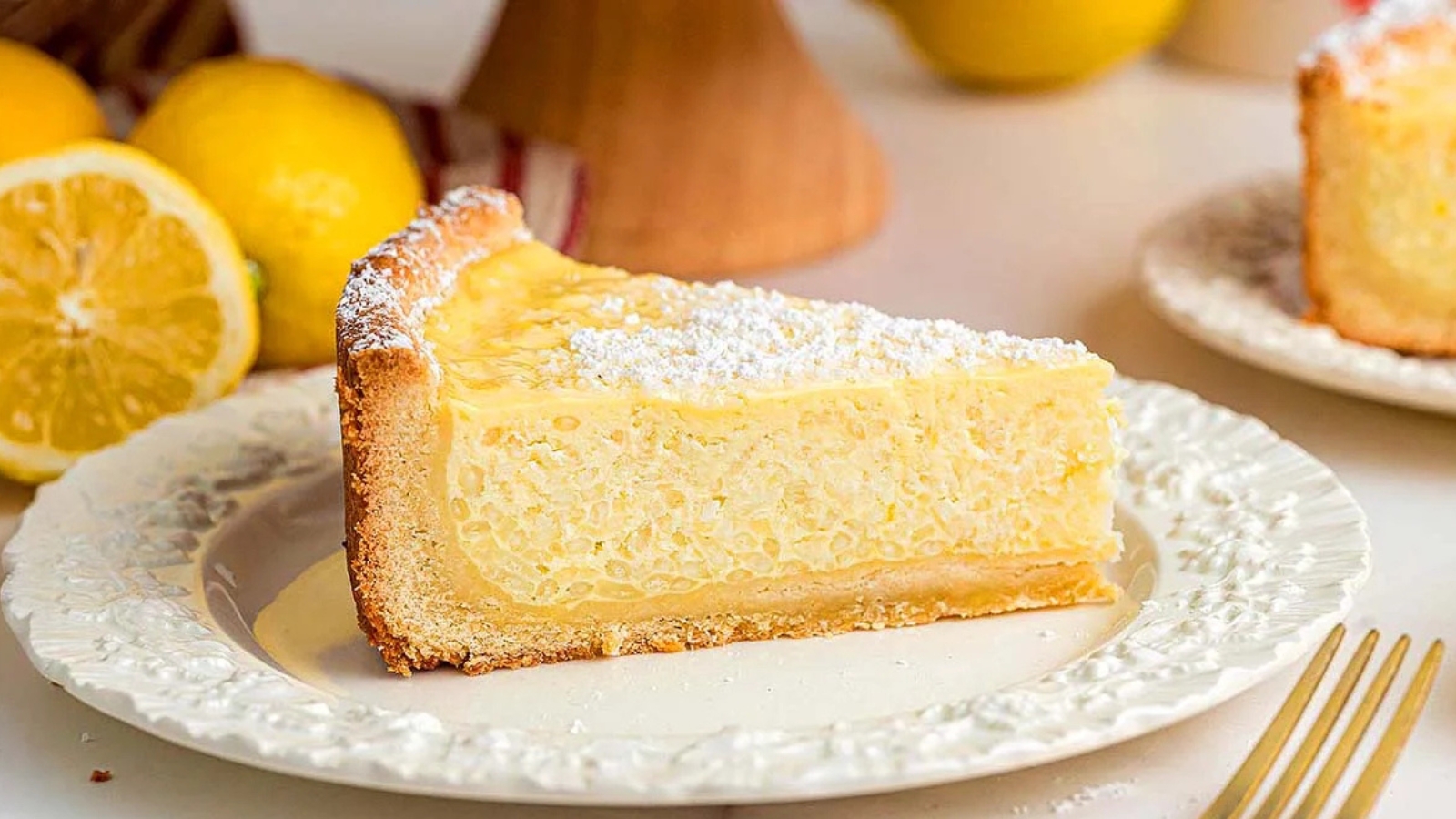 Italian rice pie with a golden crust sliced to reveal a creamy rice filling.