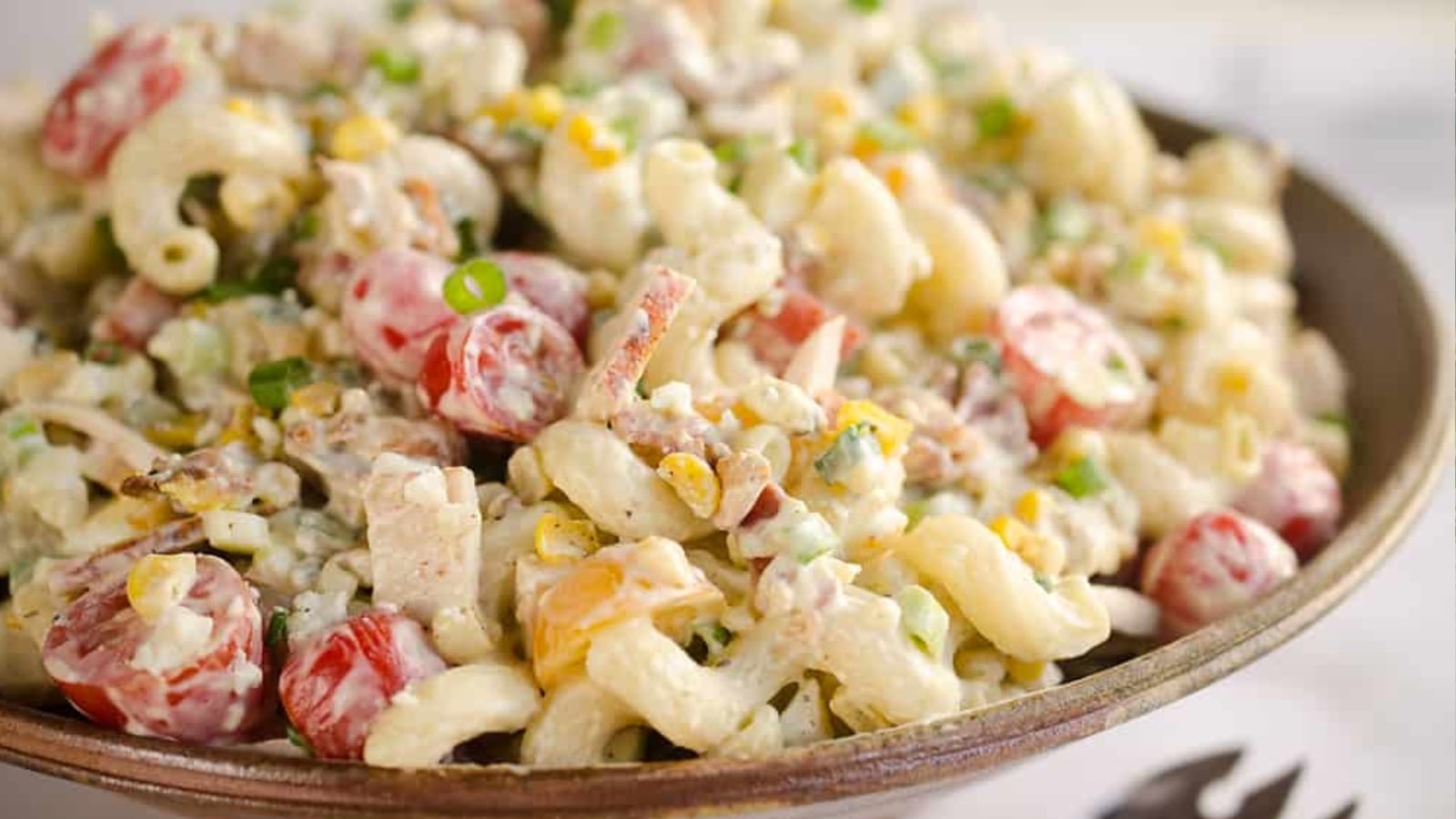 Creamy turkey Cobb pasta salad with fresh toppings.