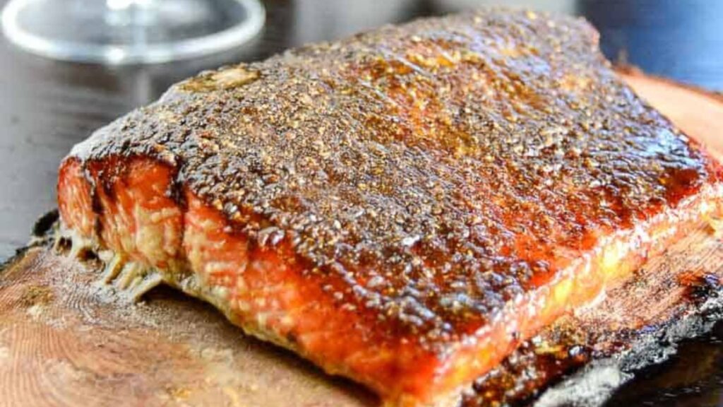 Crusted with brown sugar and spices then grilled on a wine soaked cedar plank, this garam masala cedar plank salmon is smoky sweet and sure to please.