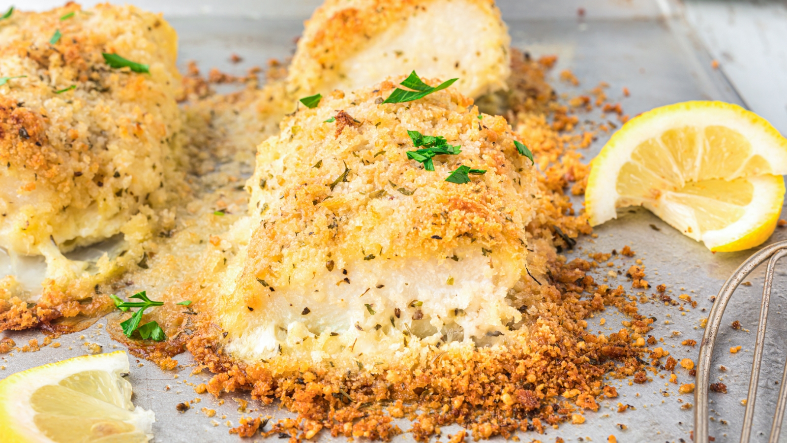 Baked cod fillets topped with a golden parmesan breadcrumb crust.