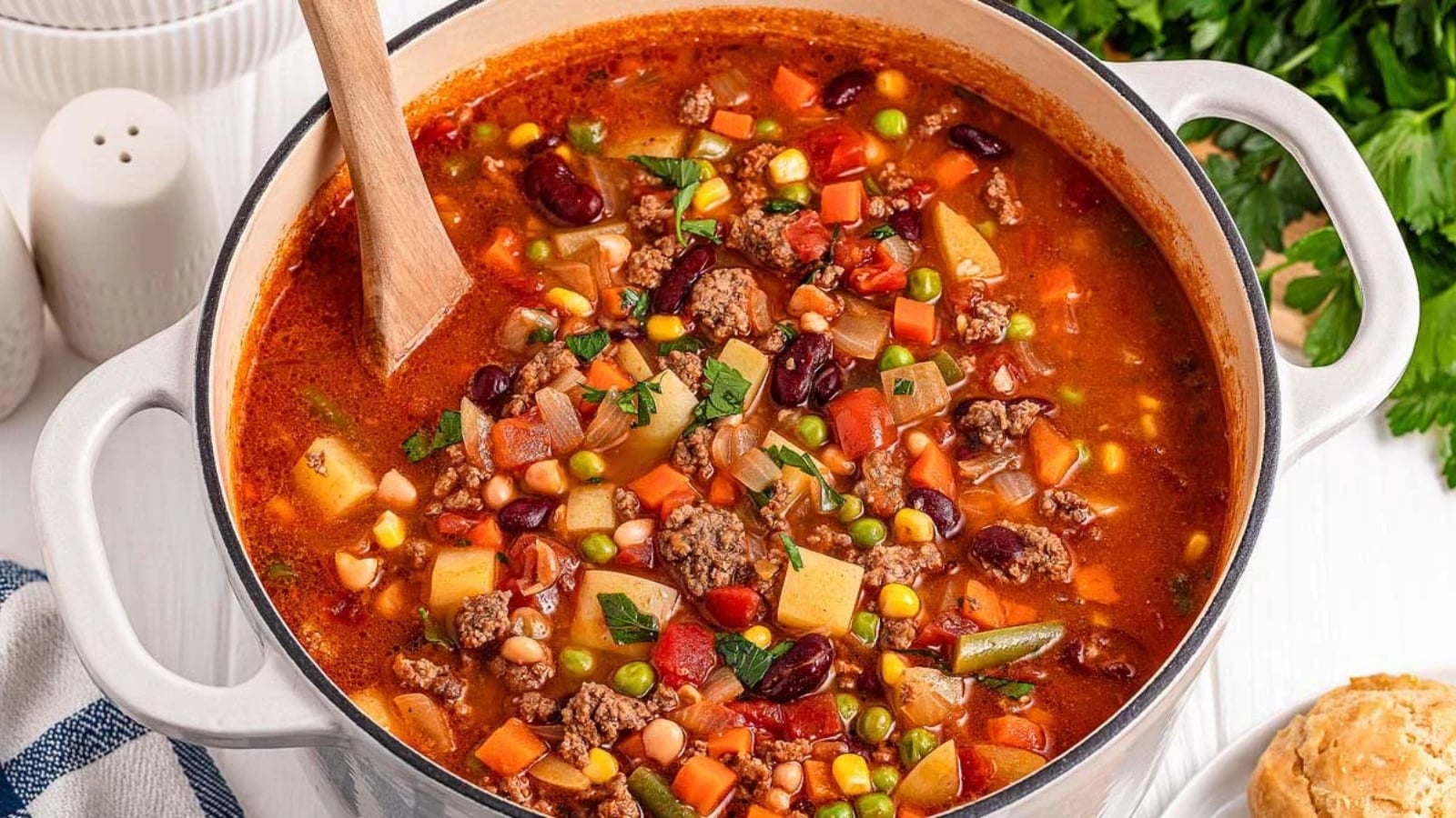 Hearty cowboy soup with beef, beans, and potatoes in a bowl.